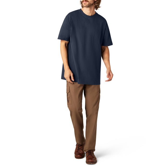 Man wearing navy blue short sleeve t-shirt with brown cargo pants and brown lace-up boots.