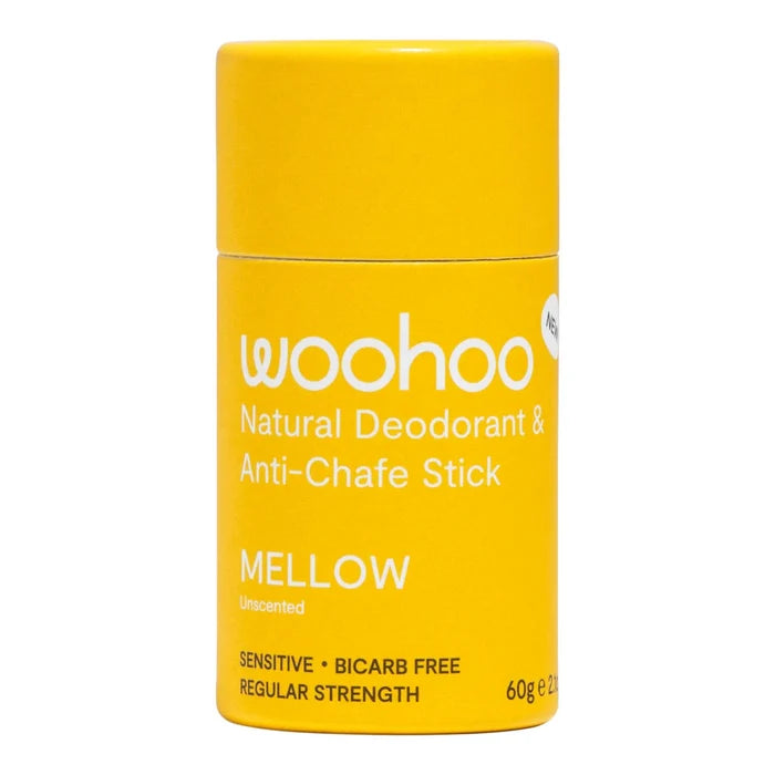 A yellow cylindrical deodorant stick container with white text reading 'woohoo Natural Deodorant & Anti-Chafe Stick' and 'MELLOW Unscented'.