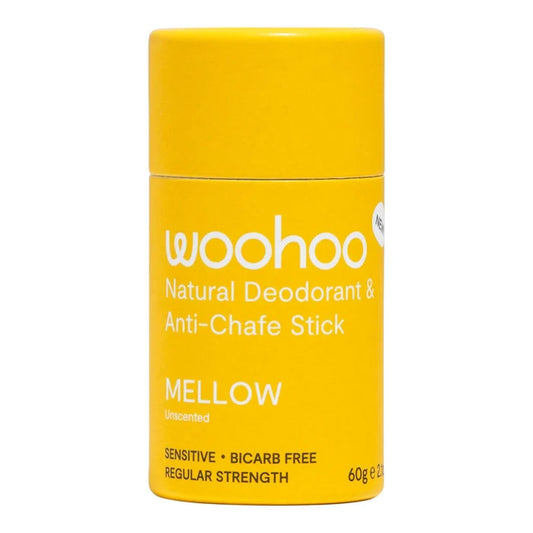 A yellow cylindrical deodorant stick container with white text reading 'woohoo Natural Deodorant & Anti-Chafe Stick' and 'MELLOW Unscented'.