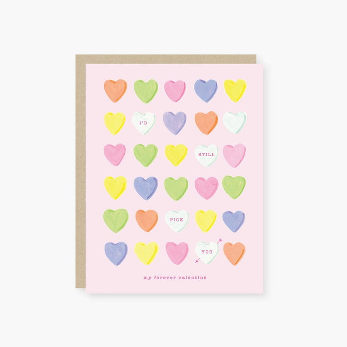 Greeting card with colorful heart pattern on a pink background