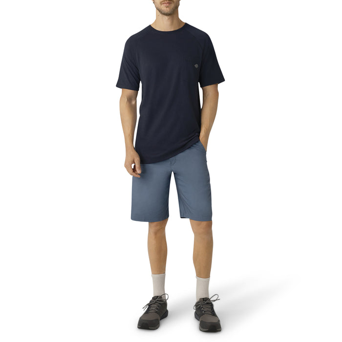 Man wearing navy short-sleeve t-shirt and blue-gray utility shorts with white socks and dark hiking boots.