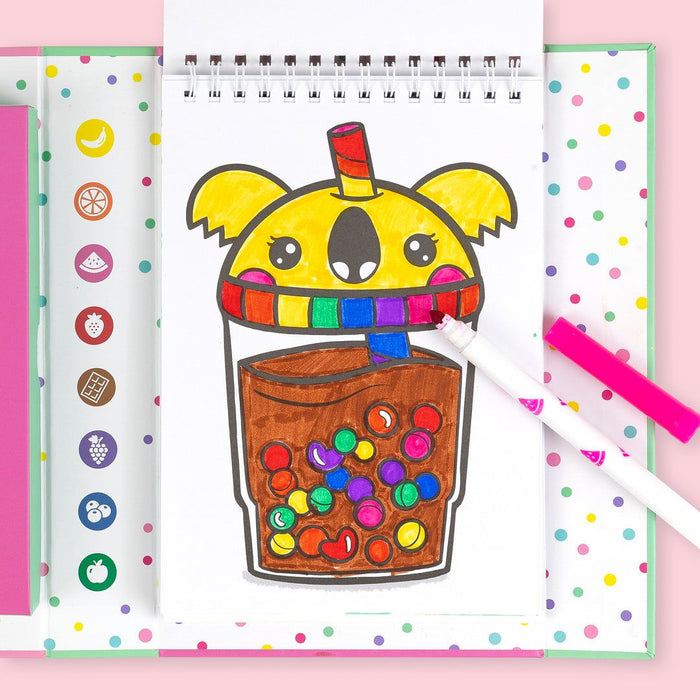 Colorful drawing of a cartoon drink with a straw on a polka dot notebook page.