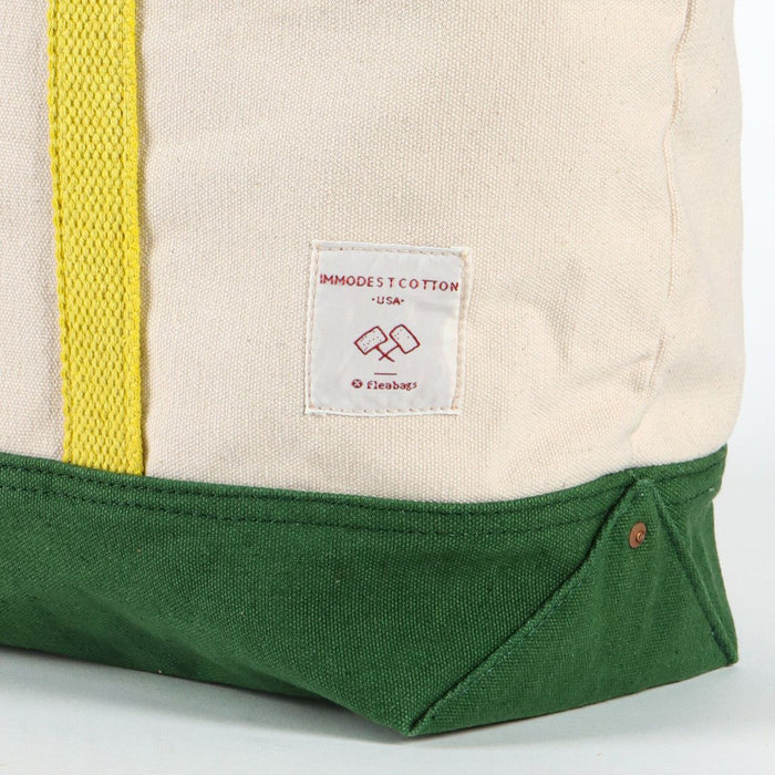 Close-up of a bag with a label on a white background