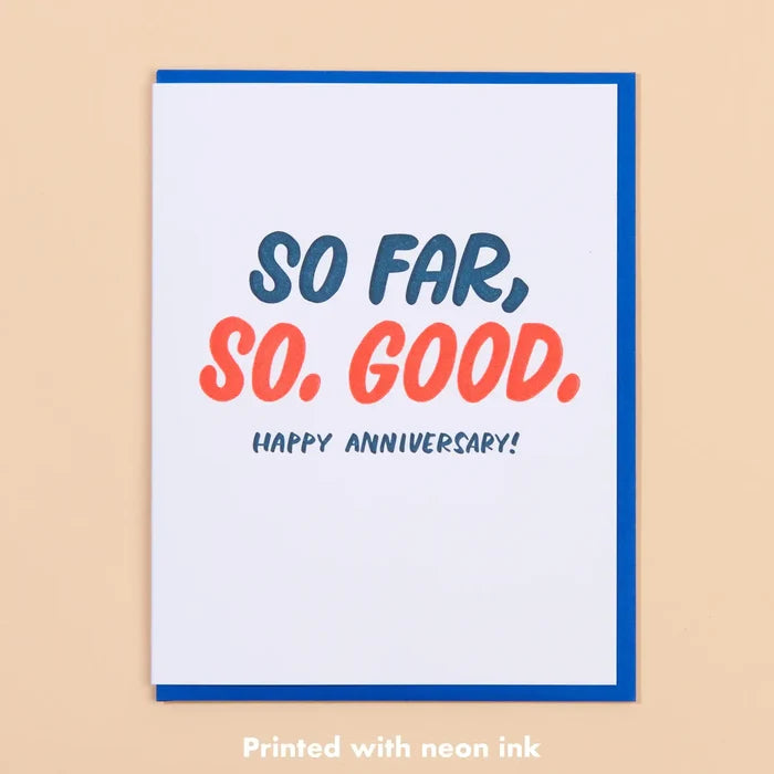 Greeting card with 'So Far, So Good, Happy Anniversary!' text on a beige background