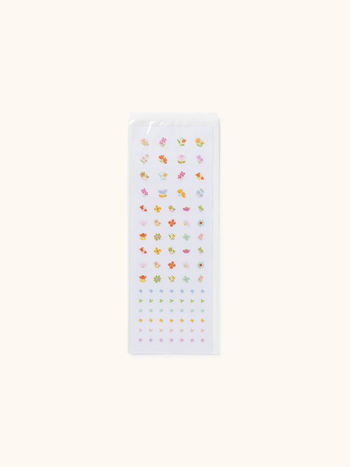 Pack of small stickers with various designs on a white background