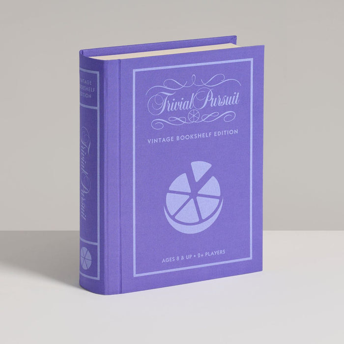 Purple 'Trivial Pursuit' game box on a gray background