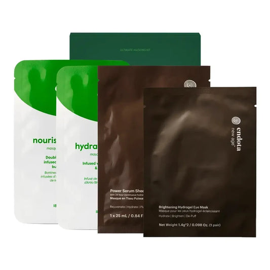 A set of four skincare pouches, including two white and green pouches, and two black pouches.